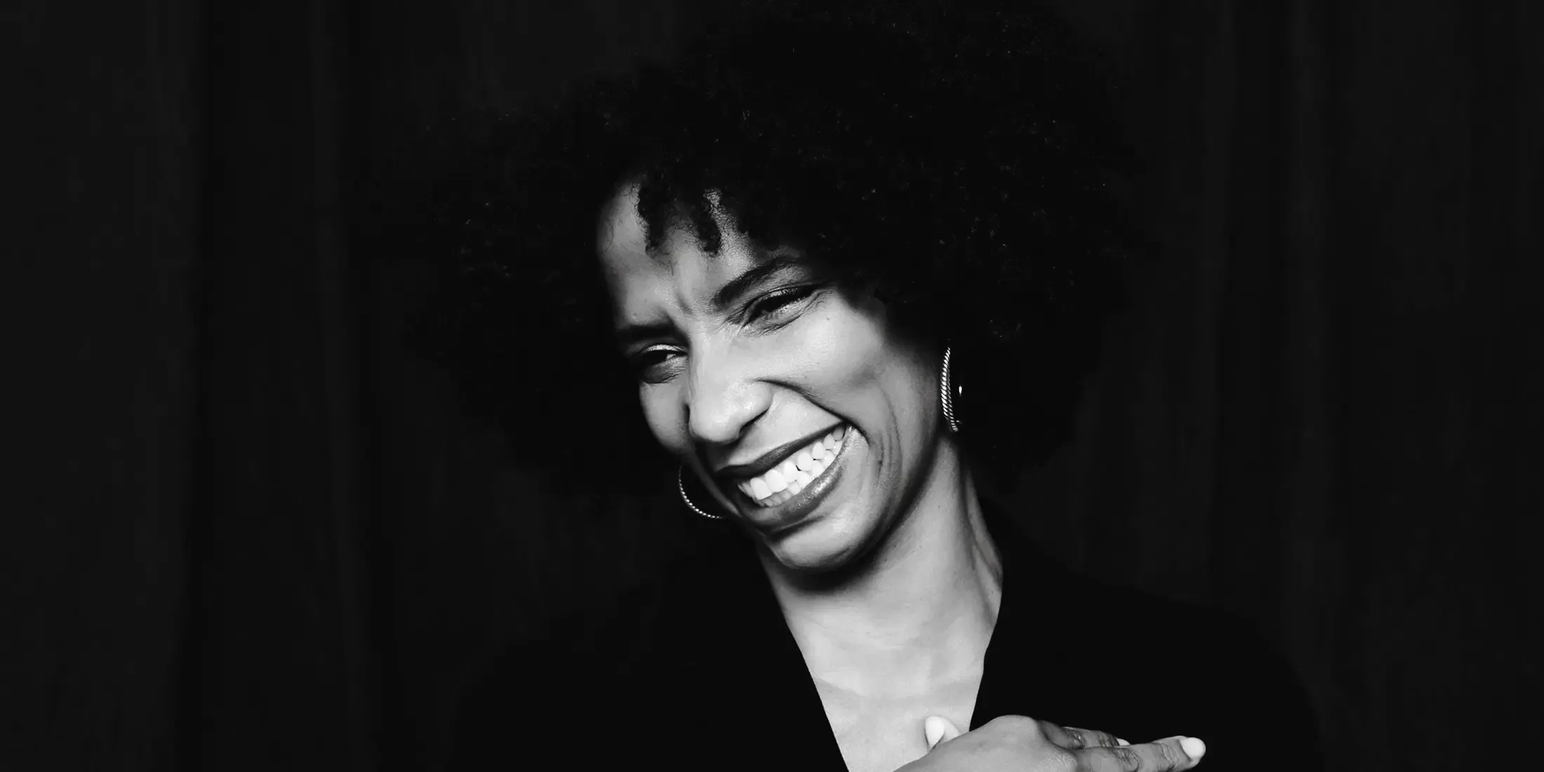 Black and white photo of women smiling