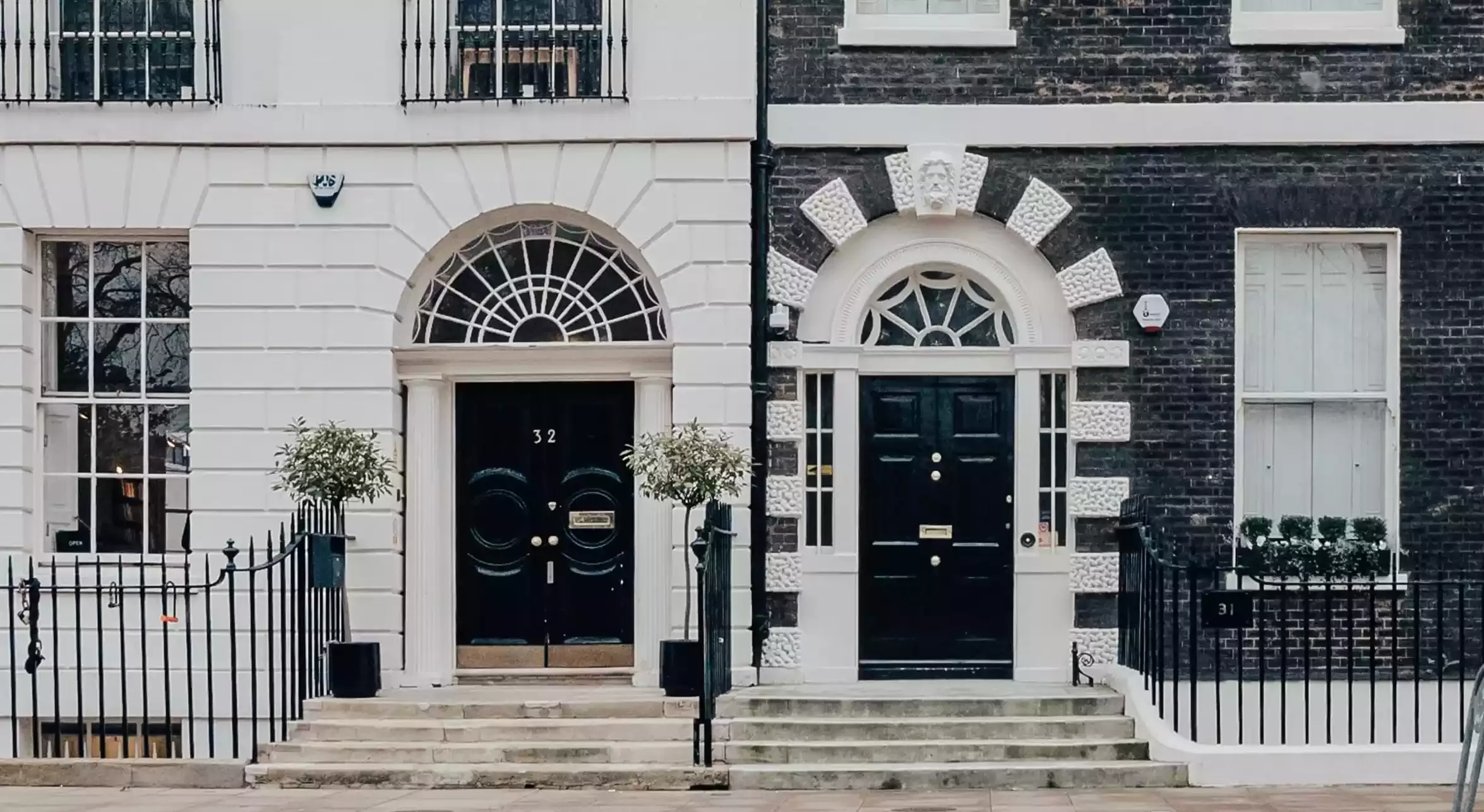 Exterior on white and black luxuriously chic London townhouses