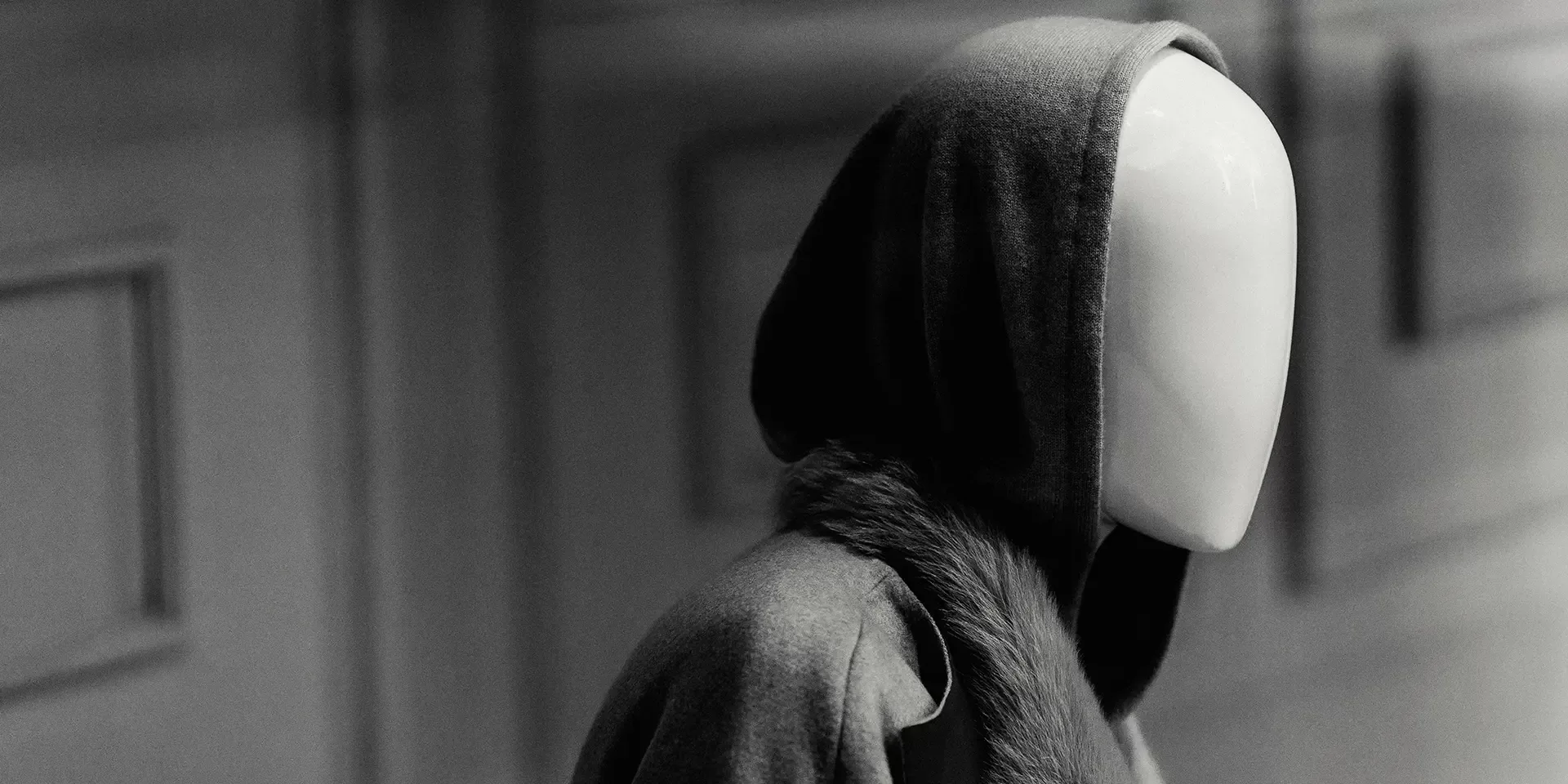 Black and white photo of mannequins wearing women's fashion