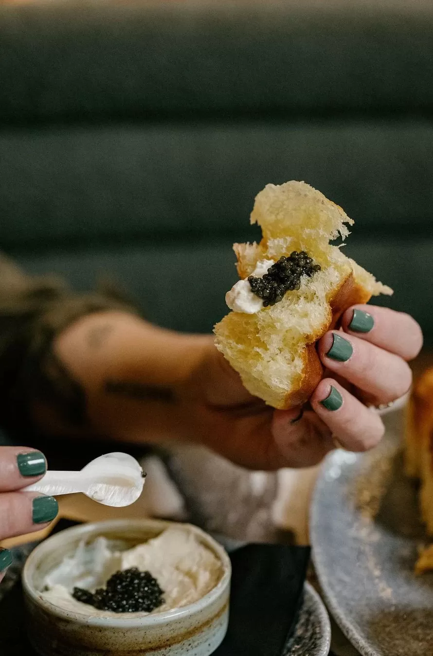 Person eating Kubaneh at K'Far, Williamsburg, Brooklyn, USA