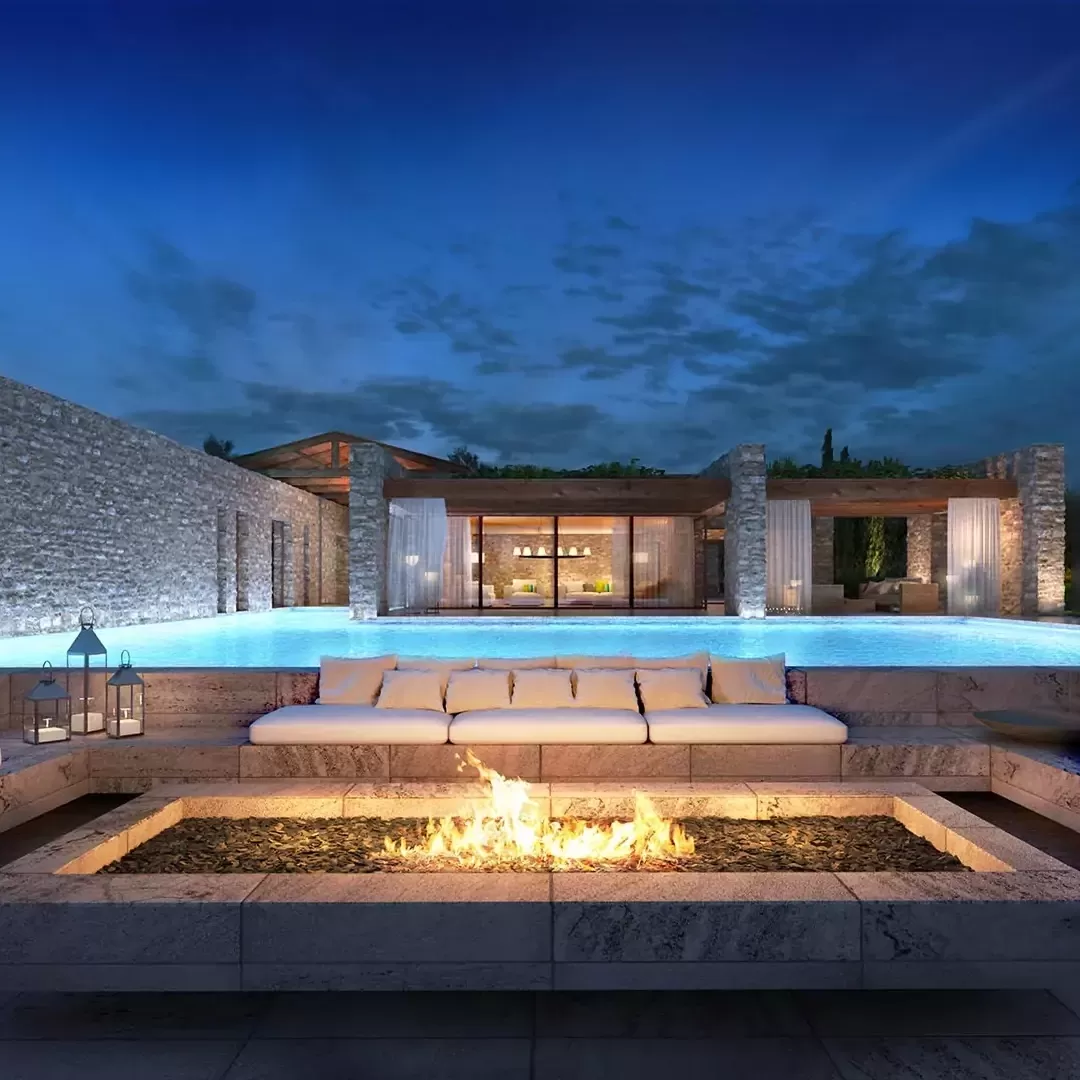 Luxury spa villa exterior with grand private outdoor pool and spa sunbed sofa with fire pit