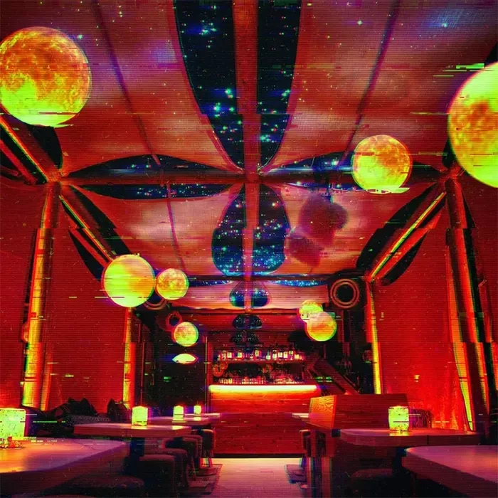A vibrant, psychedelic bar with colorful, spherical hanging lights and a ceiling resembling a starry galaxy. The room is warmly lit, featuring cozy seating and a glowing bar at the far end, creating a surreal, atmospheric setting at The Tent (at the end of the universe): Chef’s Studio﻿.
