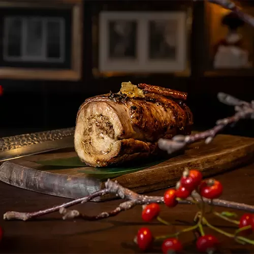 A plate of cooked stuffed Christmas turkey served at The Aubrey Knightsbridge, London.